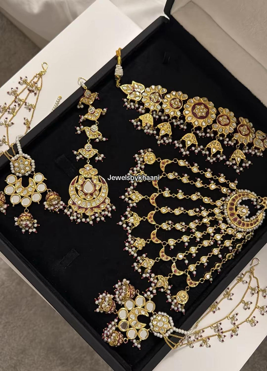 24k Gold Plated Kundan Bridal Jewellery Set, Includes choker, earrings, tikka, jhumar and nose ring.