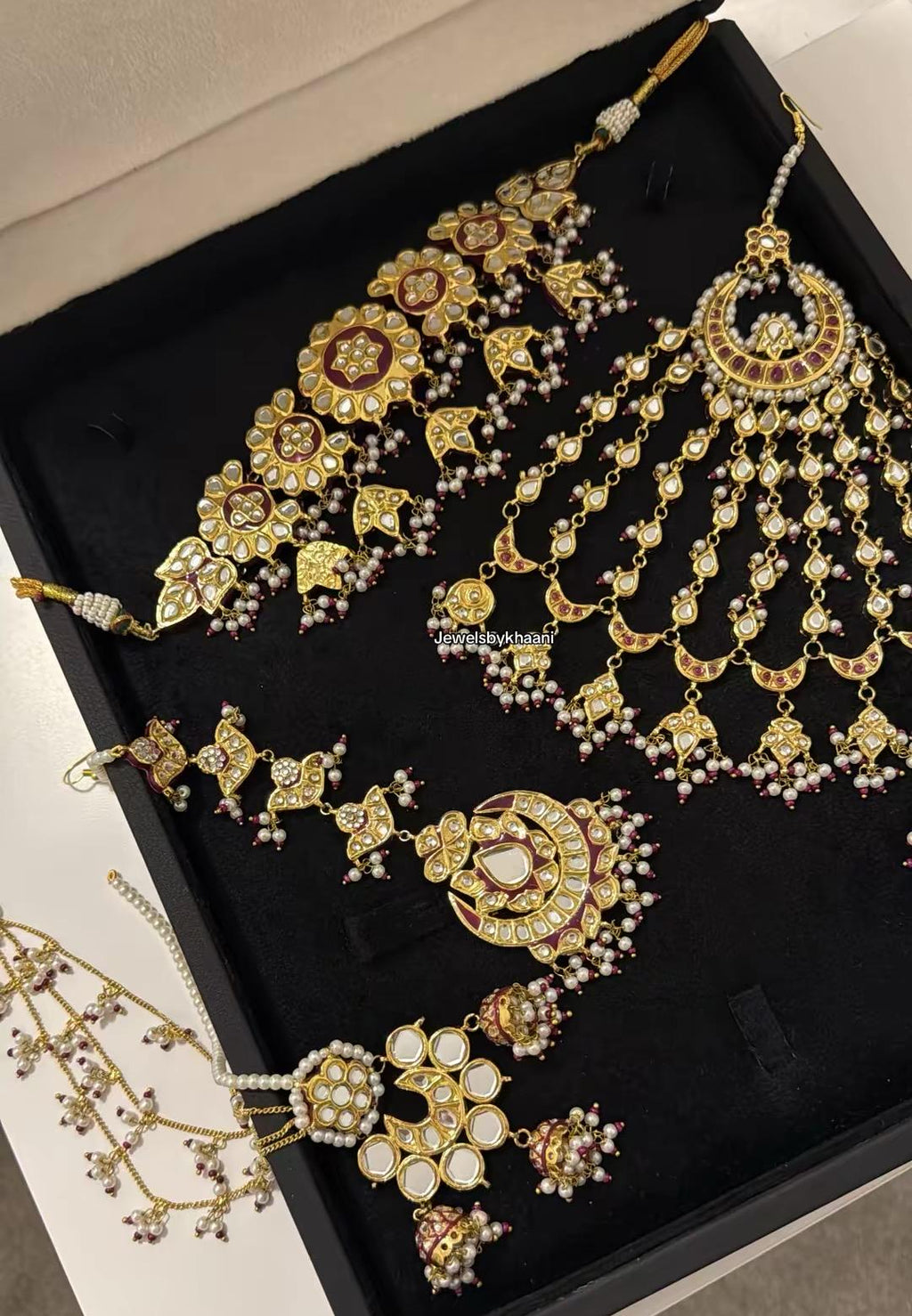 24k Gold Plated Kundan Bridal Jewellery Set, Includes choker, earrings, tikka, jhumar and nose ring.
