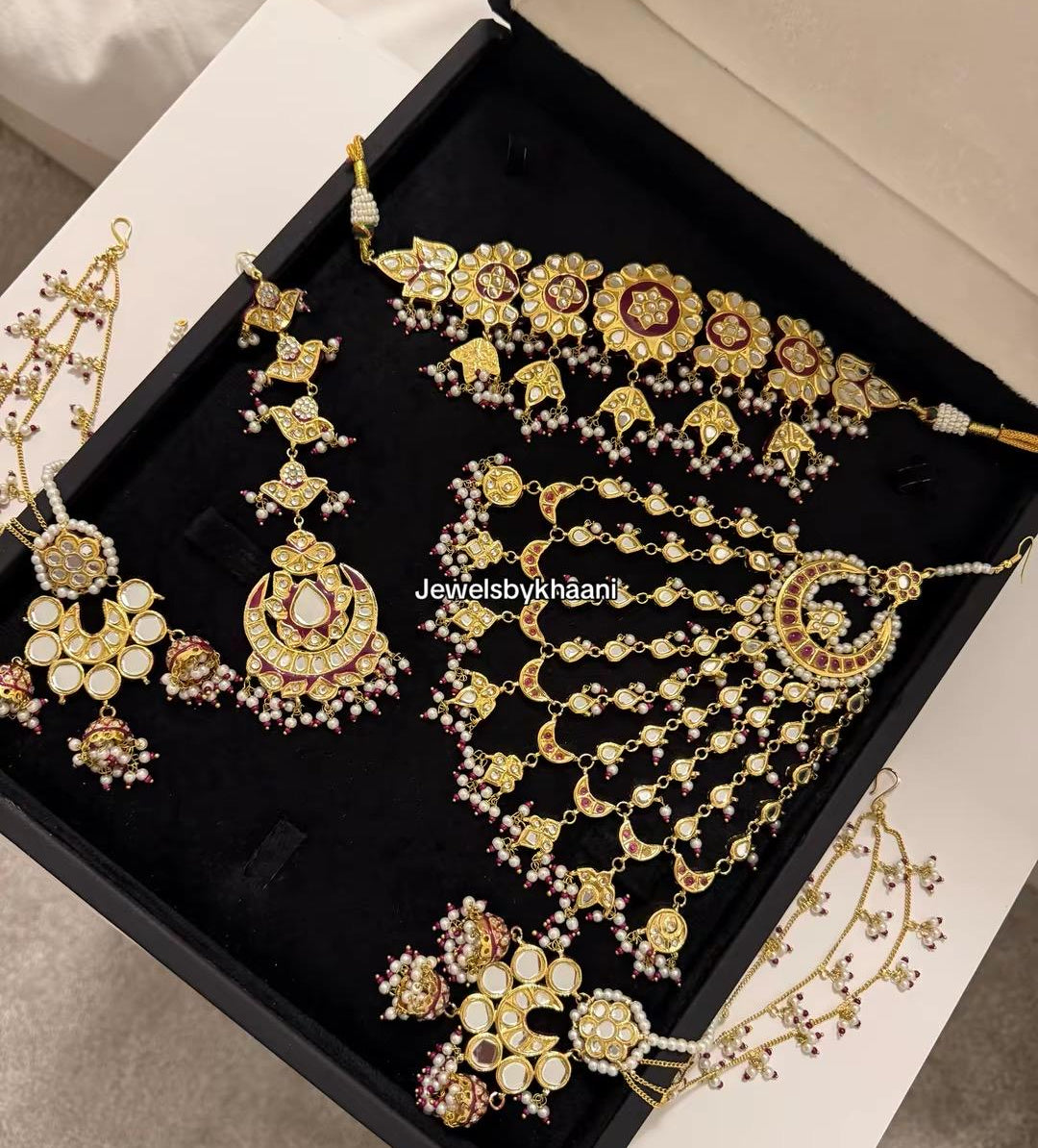 24k Gold Plated Kundan Bridal Jewellery Set, Includes choker, earrings, tikka, jhumar and nose ring.
