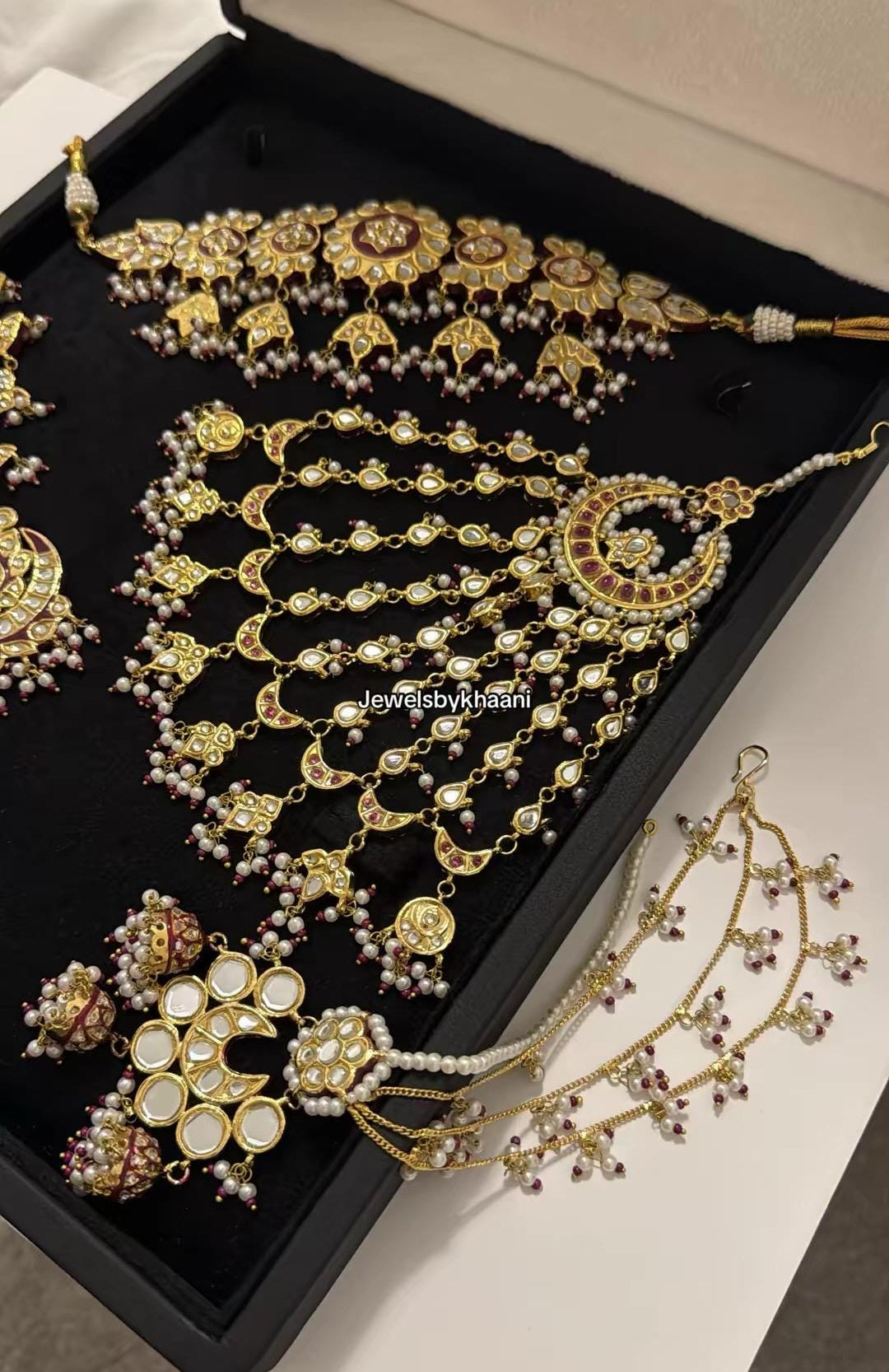 24k Gold Plated Kundan Bridal Jewellery Set, Includes choker, earrings, tikka, jhumar and nose ring.