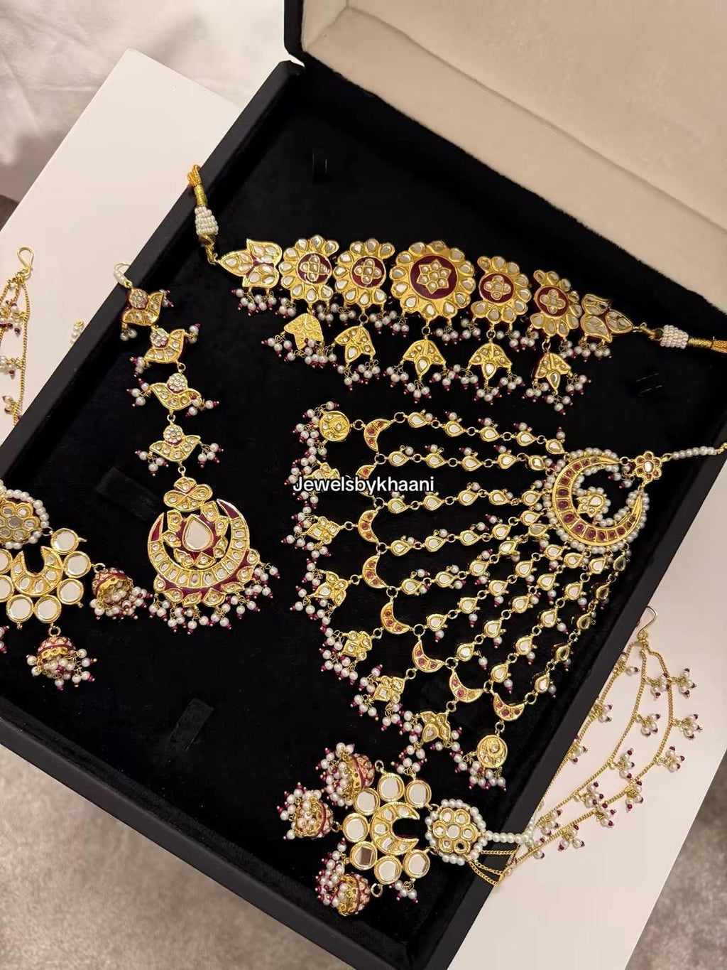 24k Gold Plated Kundan Bridal Jewellery Set, Includes choker, earrings, tikka, jhumar and nose ring.